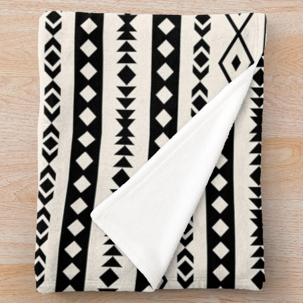 Plush Aztec-inspired patterned blanket in cream and black colors