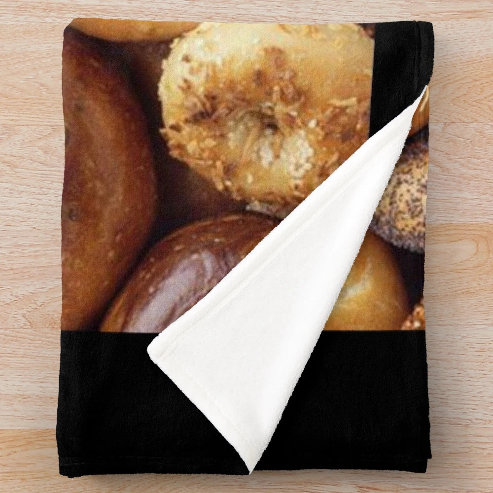 Plush bagel-themed blanket for a cozy and comforting home