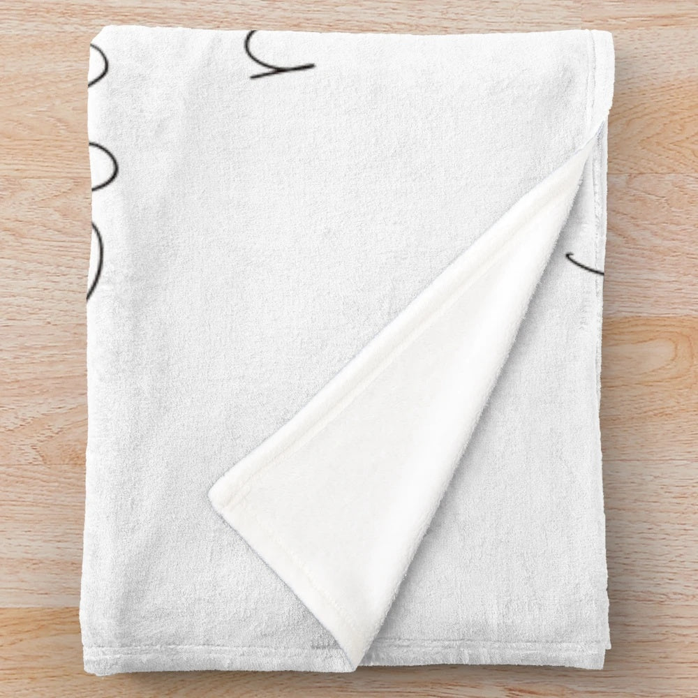 Cozy plush blanket featuring the message "Books Not Guns, Culture Not Violence