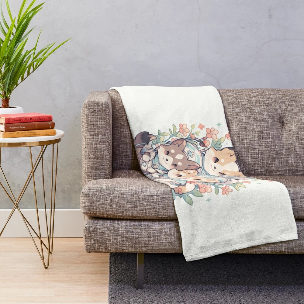 Plush blanket featuring a group of nurse dogs in a hospital setting