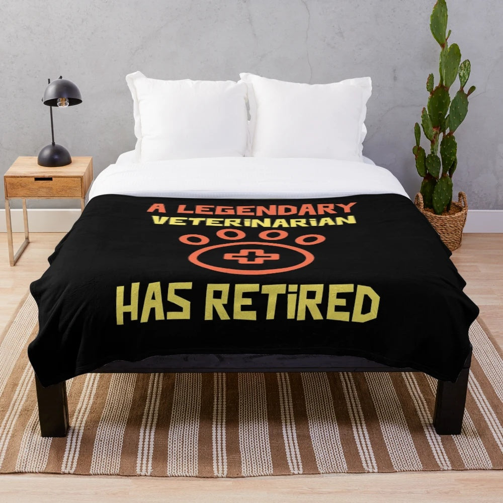 A cozy plush blanket featuring a design celebrating the retirement of a legendary veterinarian