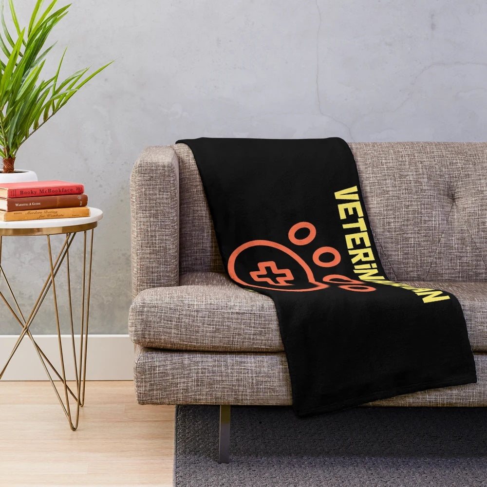 A cozy plush blanket featuring a design celebrating the retirement of a legendary veterinarian
