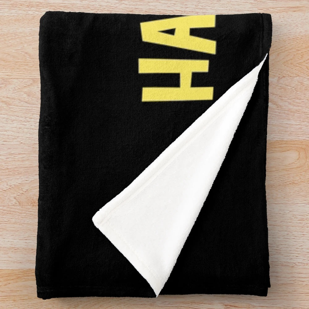 A cozy plush blanket featuring a design celebrating the retirement of a legendary veterinarian