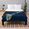Plush blanket featuring Norwegian flag and scenic landscape