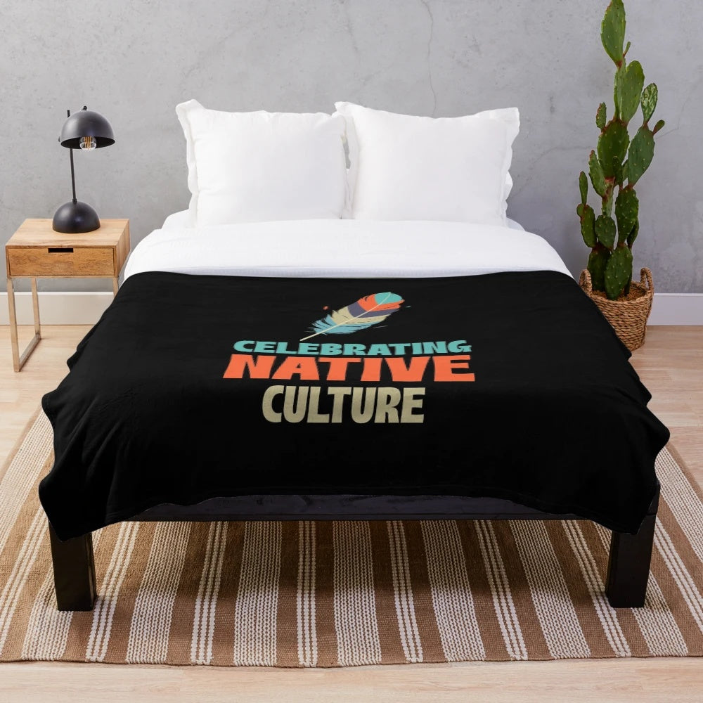 Plush blanket featuring Native American-inspired tribal patterns and cultural elements