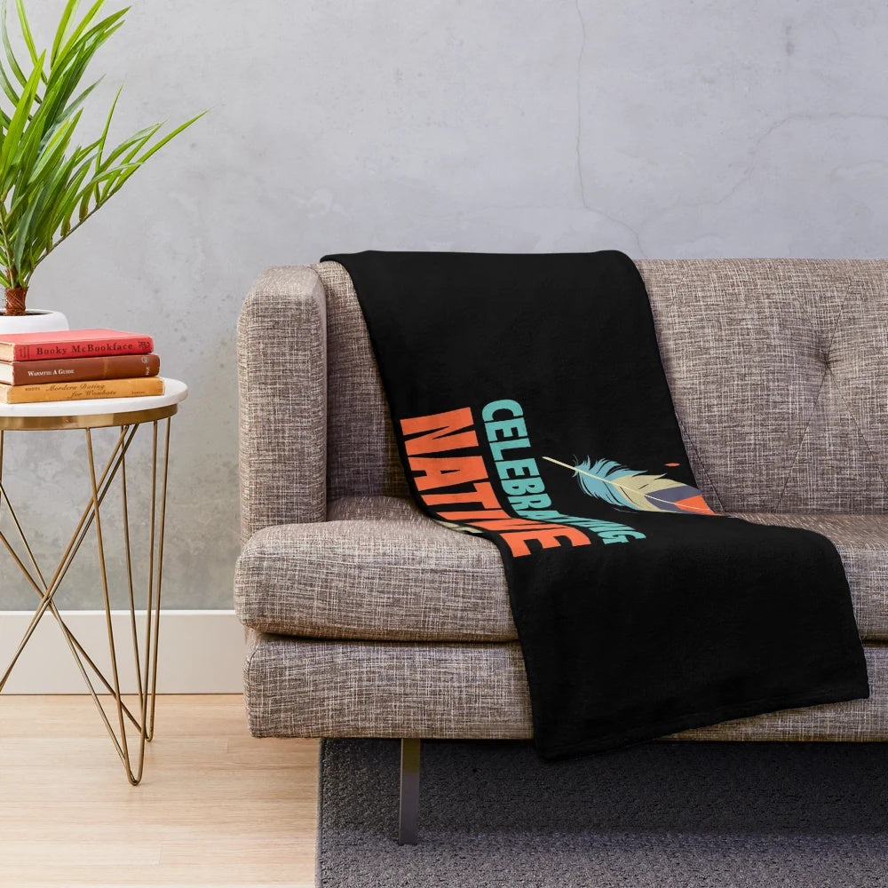 Plush blanket featuring Native American-inspired tribal patterns and cultural elements