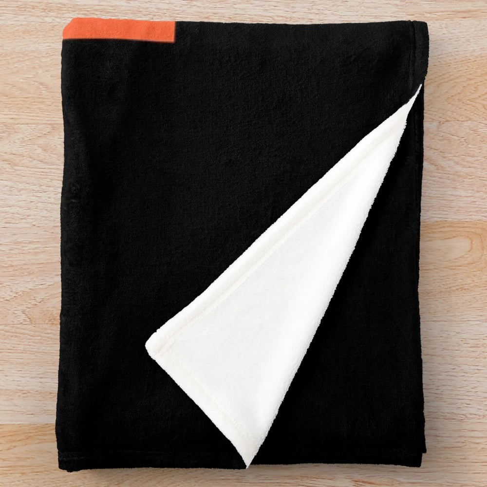 Plush blanket featuring Native American-inspired tribal patterns and cultural elements