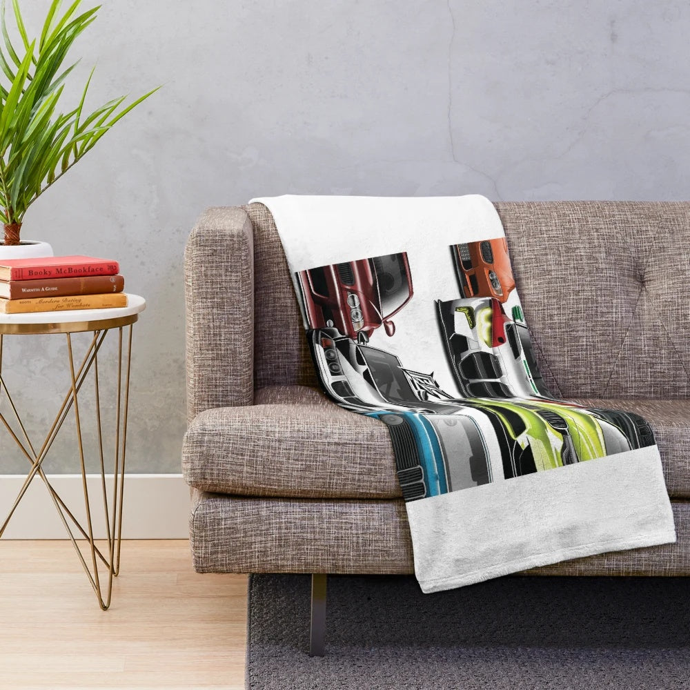 Plush blanket featuring the evolution of German sports cars