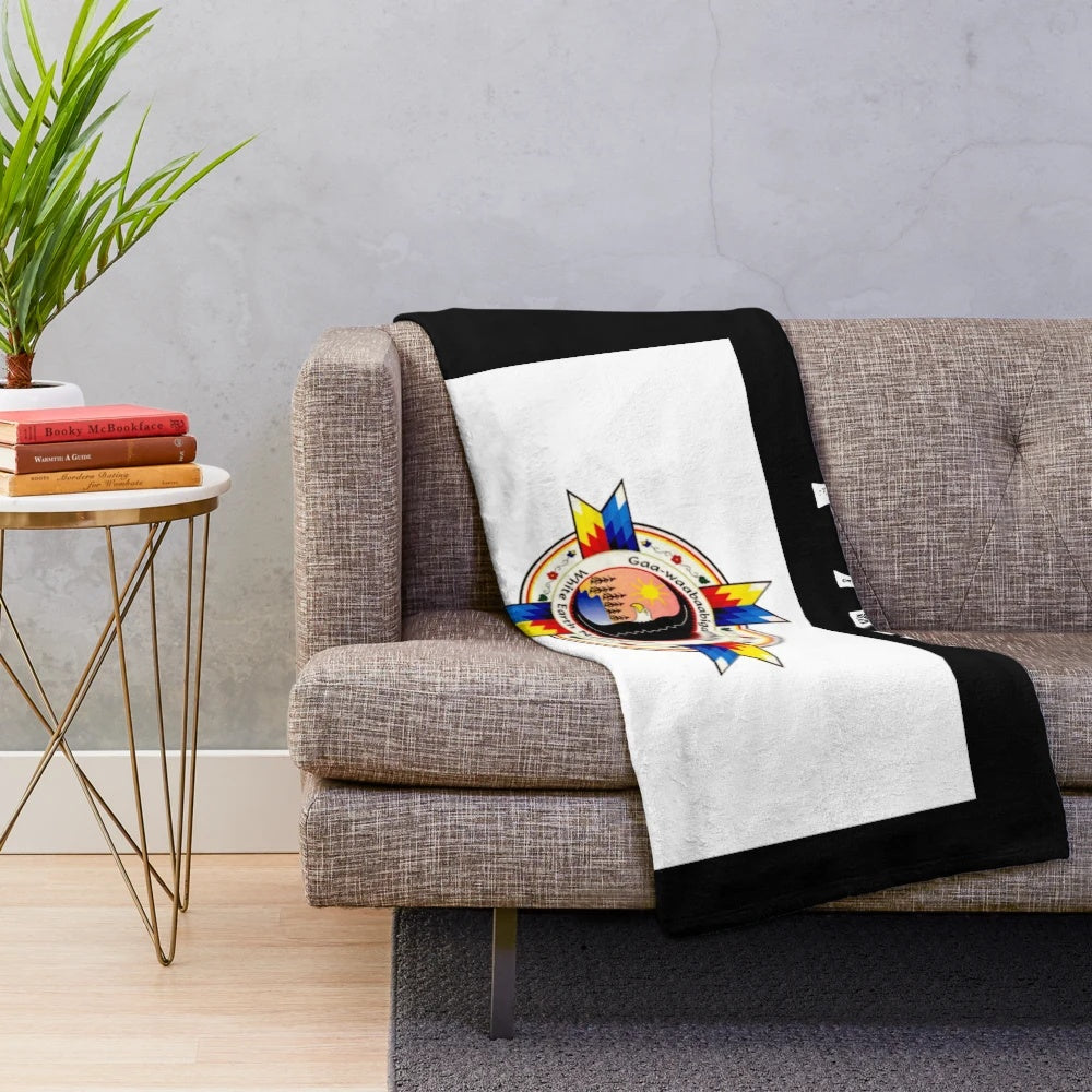 White Earth Nation Plush Blanket featuring tribal flags and indigenous designs