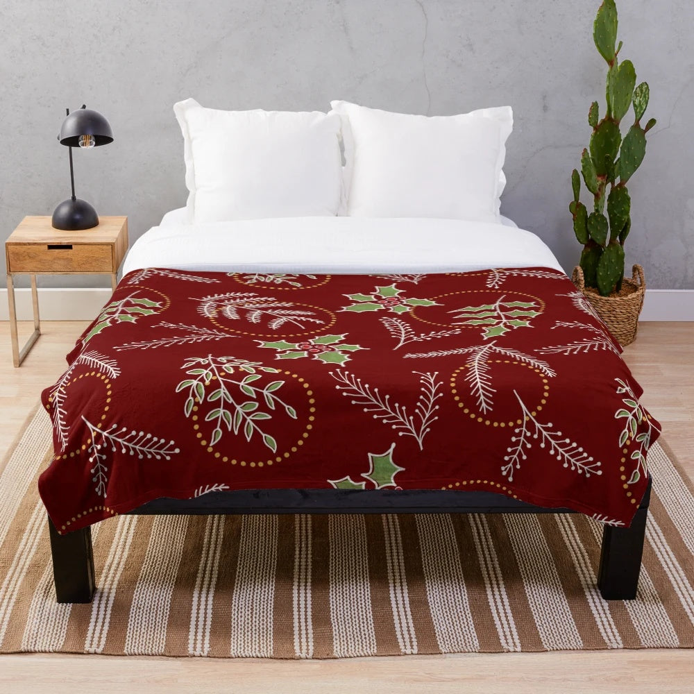 Plush Christmas and winter themed blanket with festive patterns and colors