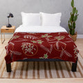Plush Christmas and winter themed blanket with festive patterns and colors
