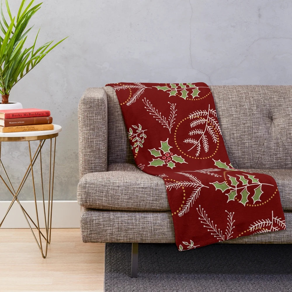 Plush Christmas and winter themed blanket with festive patterns and colors