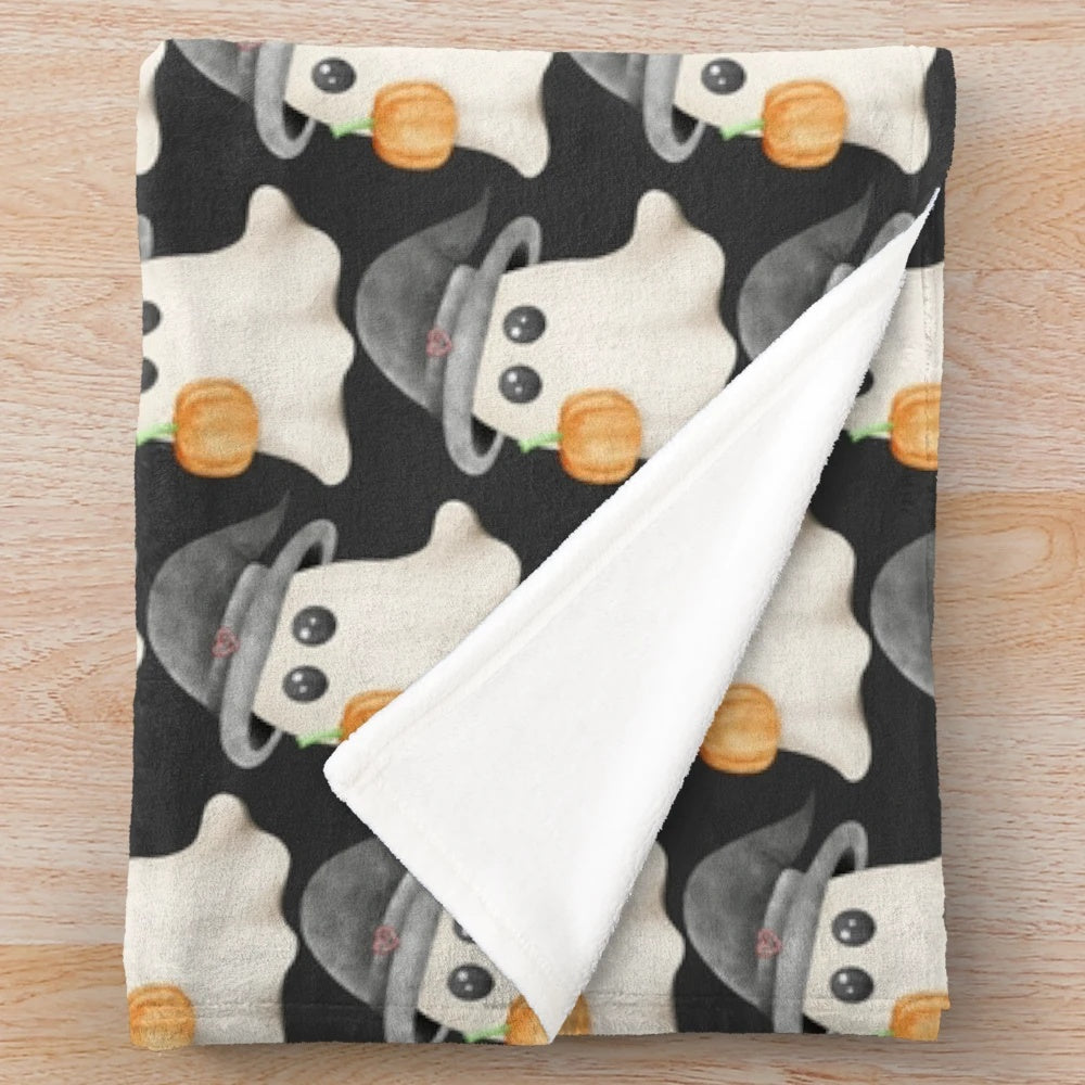 Soft and fluffy plush blanket featuring a cute ghost pumpkin design