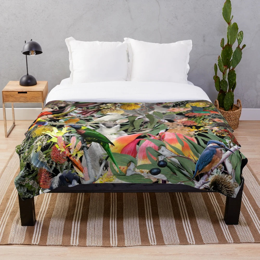 Plush blanket with Australian native animals like kangaroo, echidna, and cockatoo