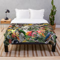 Plush blanket with Australian native animals like kangaroo, echidna, and cockatoo