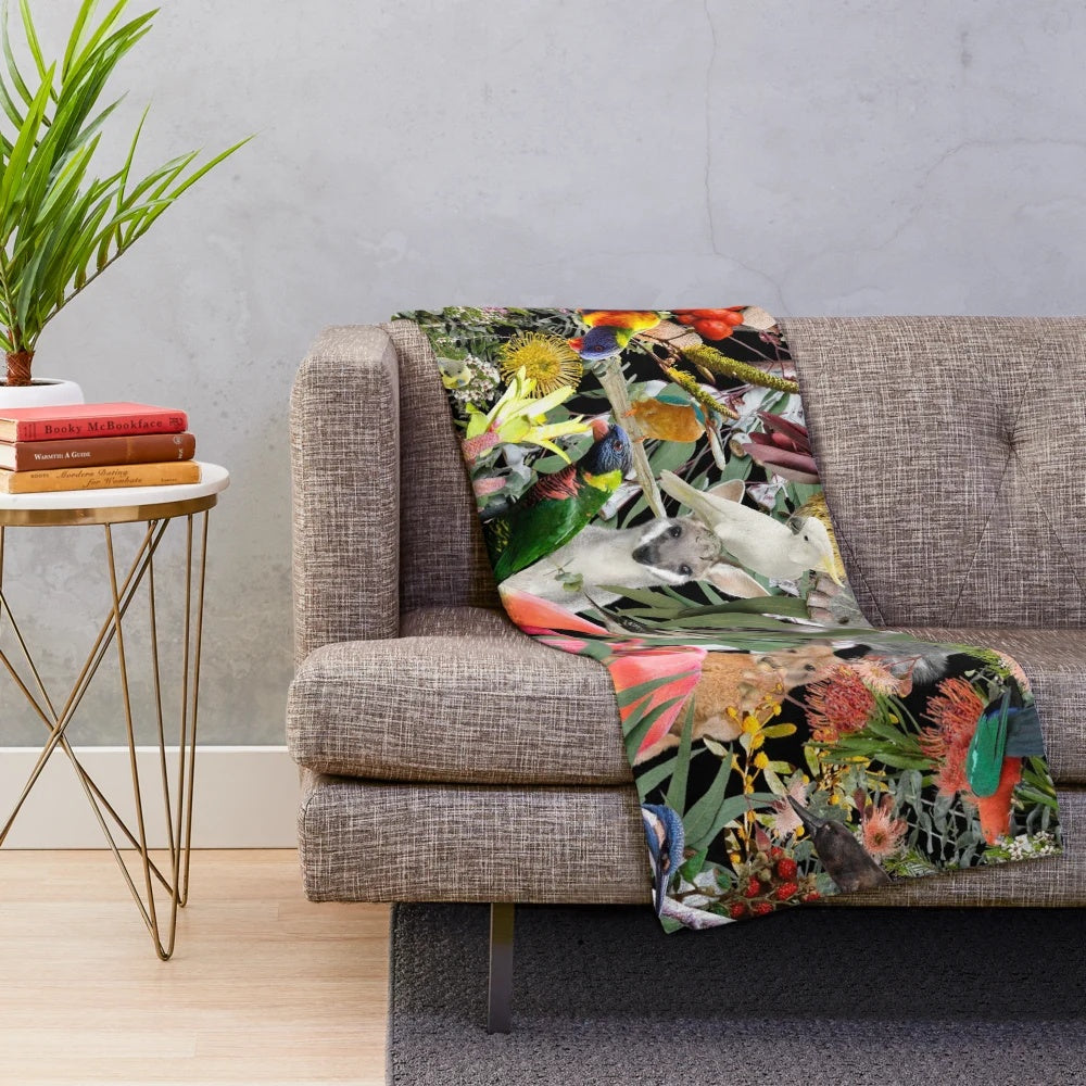 Plush blanket with Australian native animals like kangaroo, echidna, and cockatoo