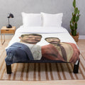 Plush blanket with images of Chris Evans and Chris Hemsworth, the popular Marvel movie stars