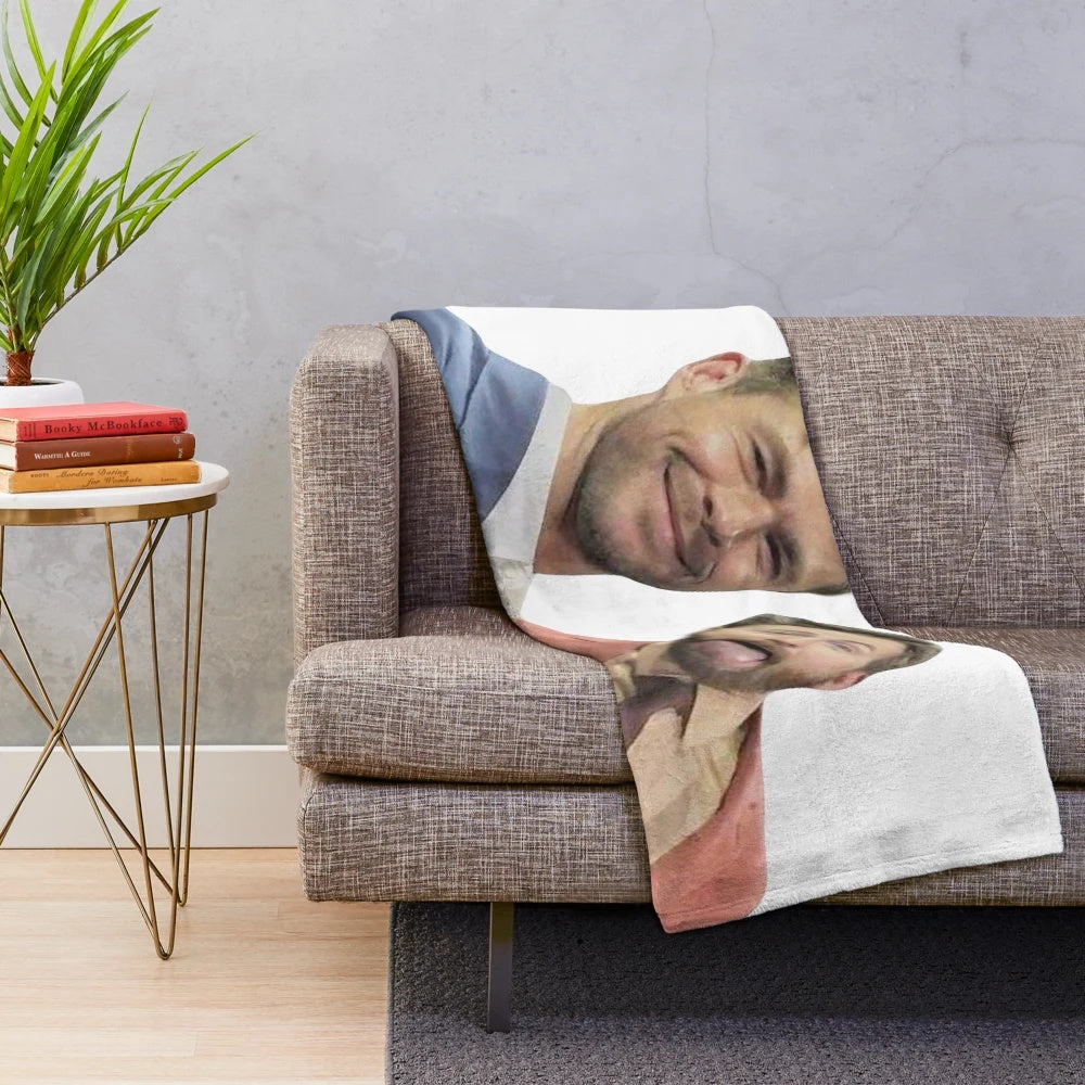 Plush blanket with images of Chris Evans and Chris Hemsworth, the popular Marvel movie stars