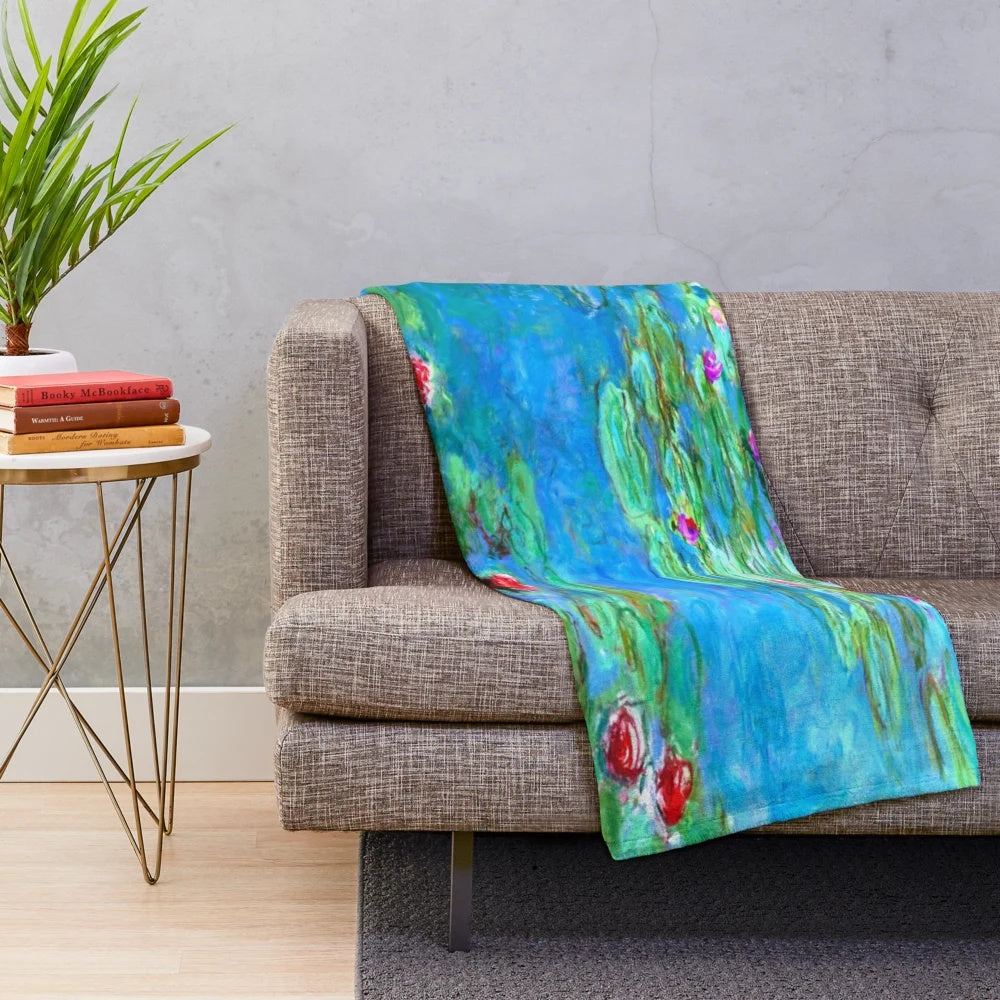 Plush blanket with Claude Monet's water lily painting in cyan blue hues