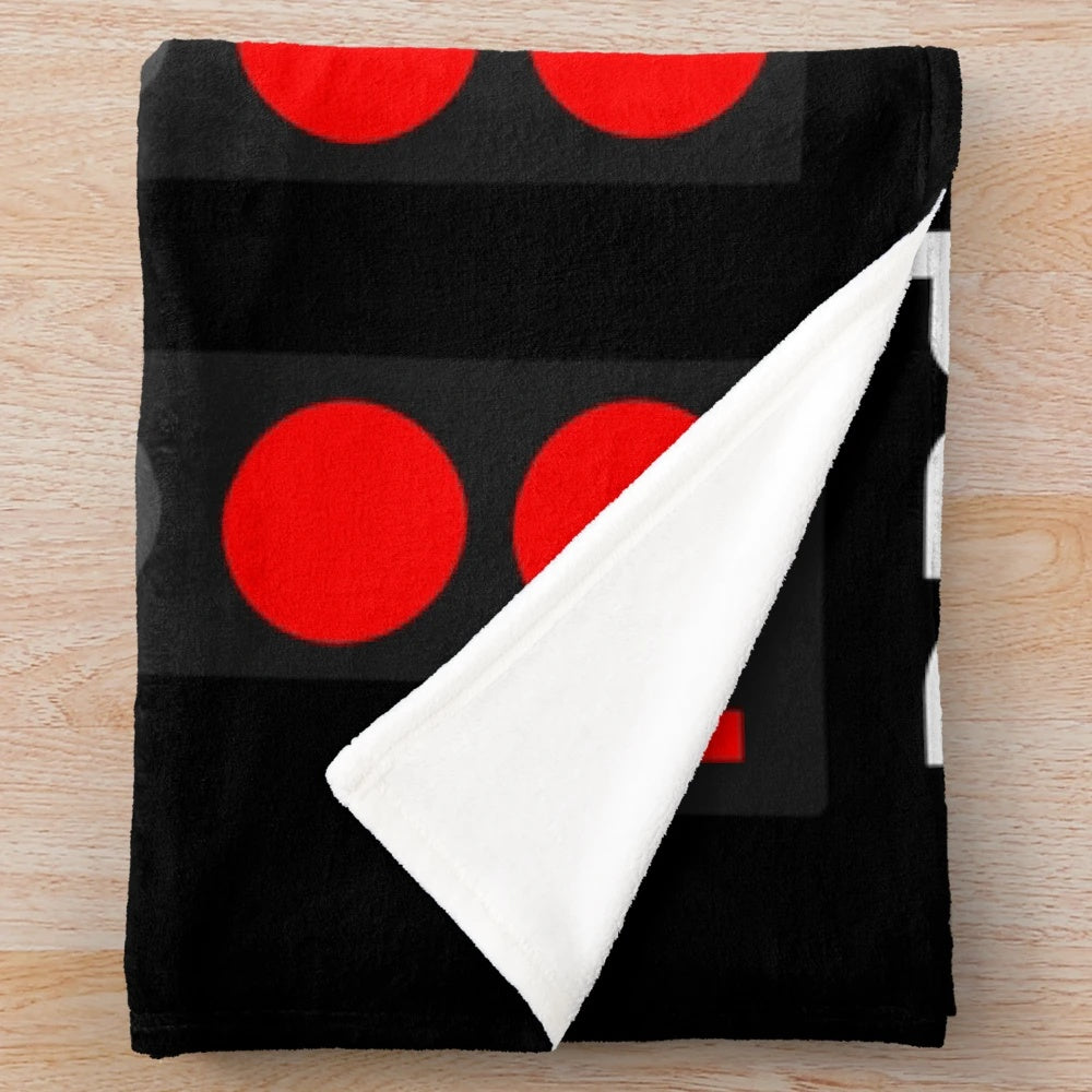 Plush blanket with F1 racing, commentators, and champions