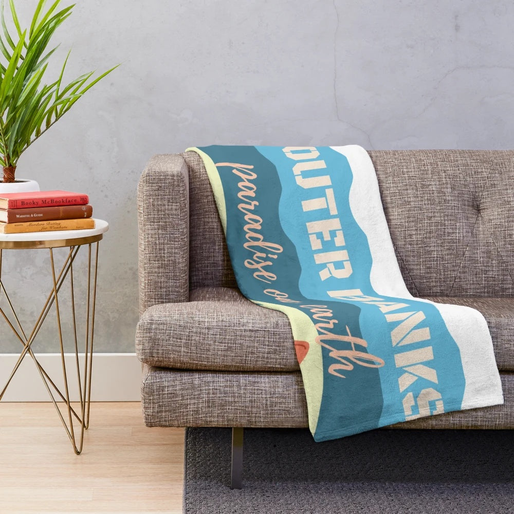 Plush blanket with Outer Banks quotes and characters