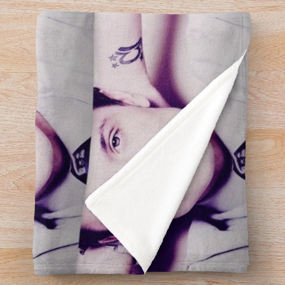 Josh Hutcherson as Peeta Mellark whispering with plush blanket