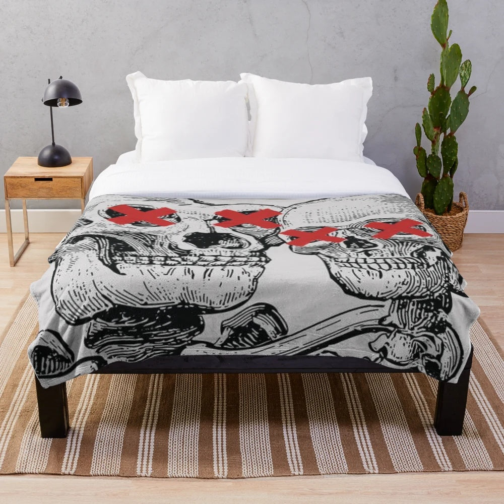 Cozy plush blanket with indie music inspired skeleton friend design