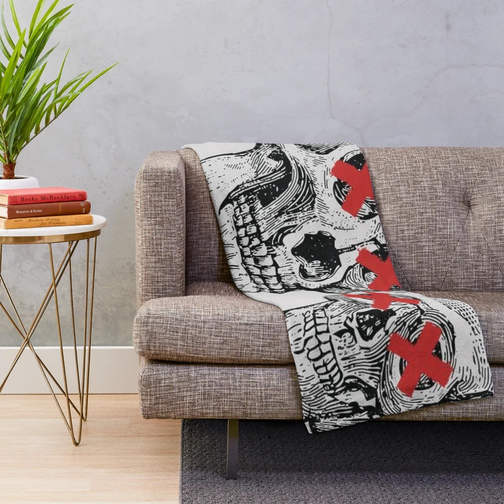 Cozy plush blanket with indie music inspired skeleton friend design