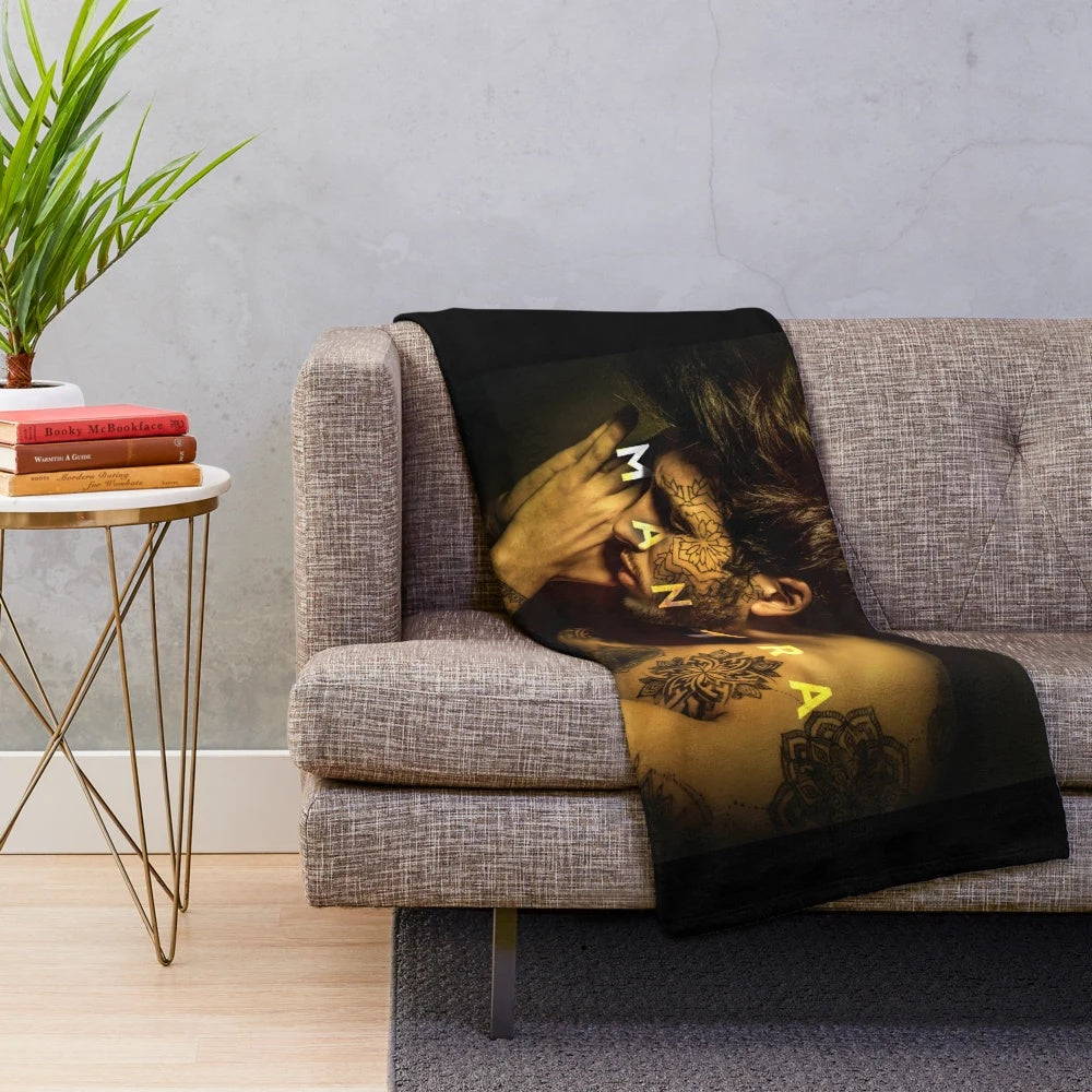 Plush blanket with the name and image of Latin music artist Sebastian Yatra's MANTRA