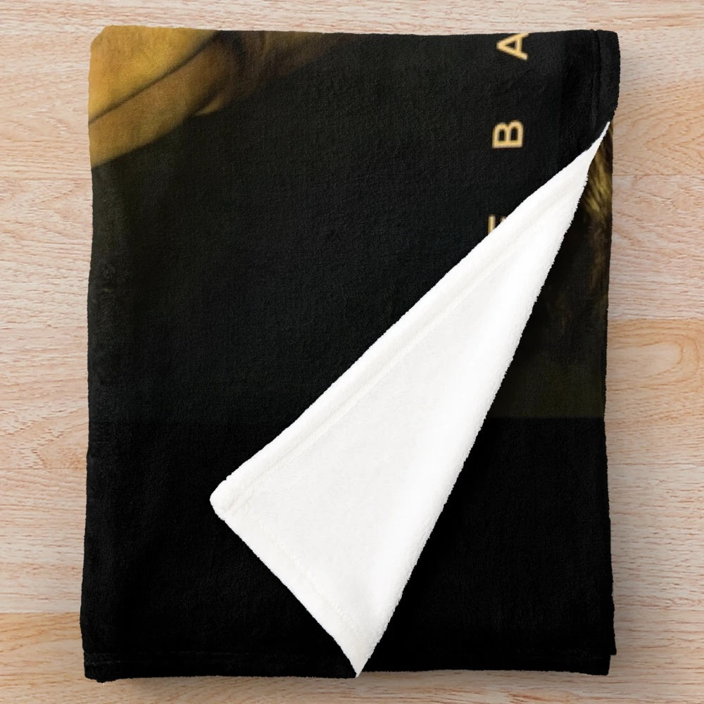 Plush blanket with the name and image of Latin music artist Sebastian Yatra's MANTRA
