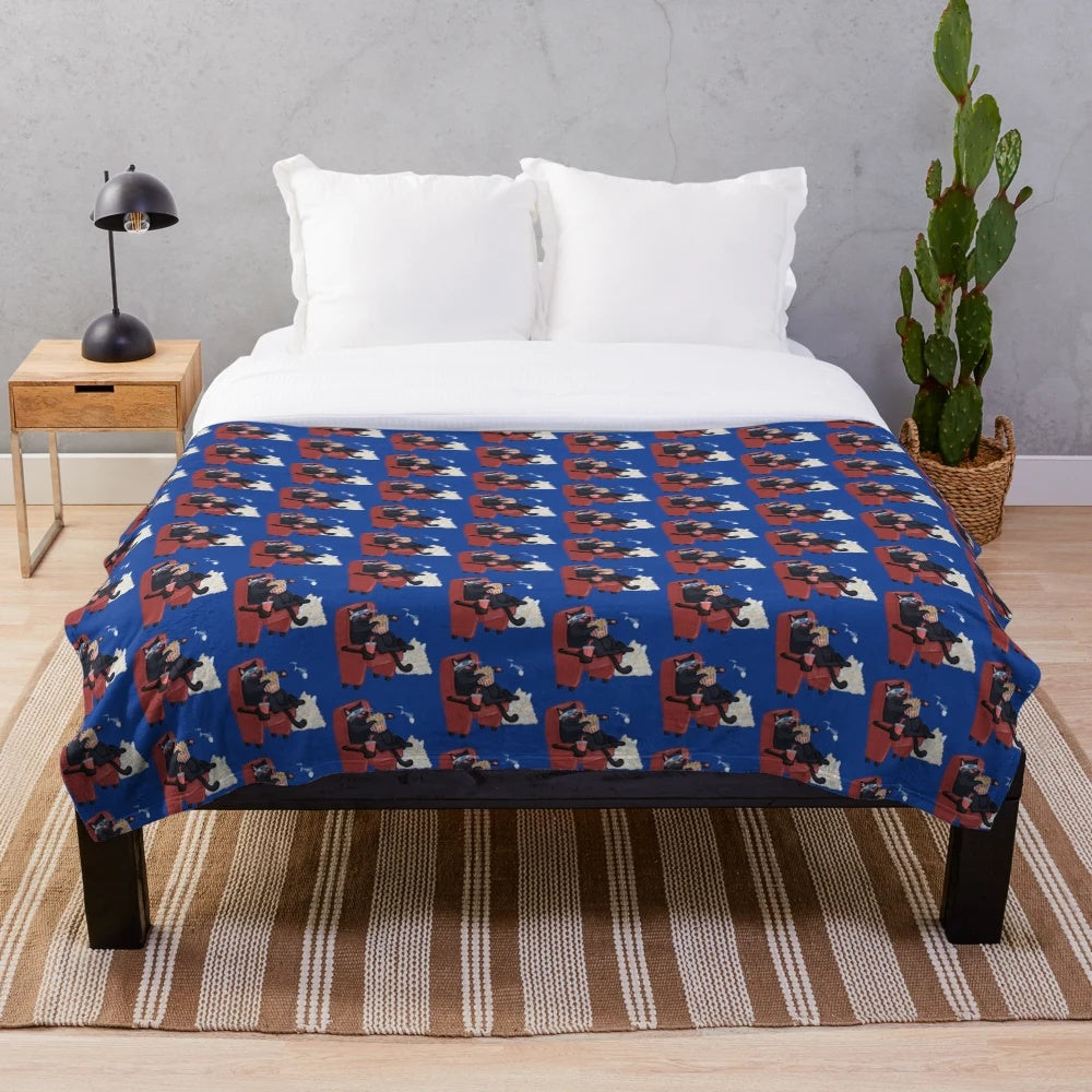 Colorful plush blanket with playful cat designs