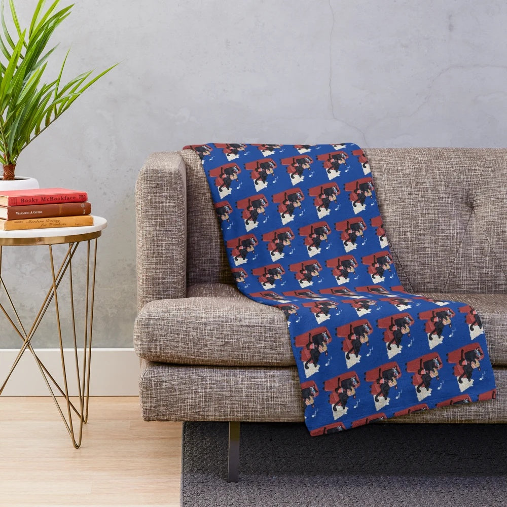 Colorful plush blanket with playful cat designs