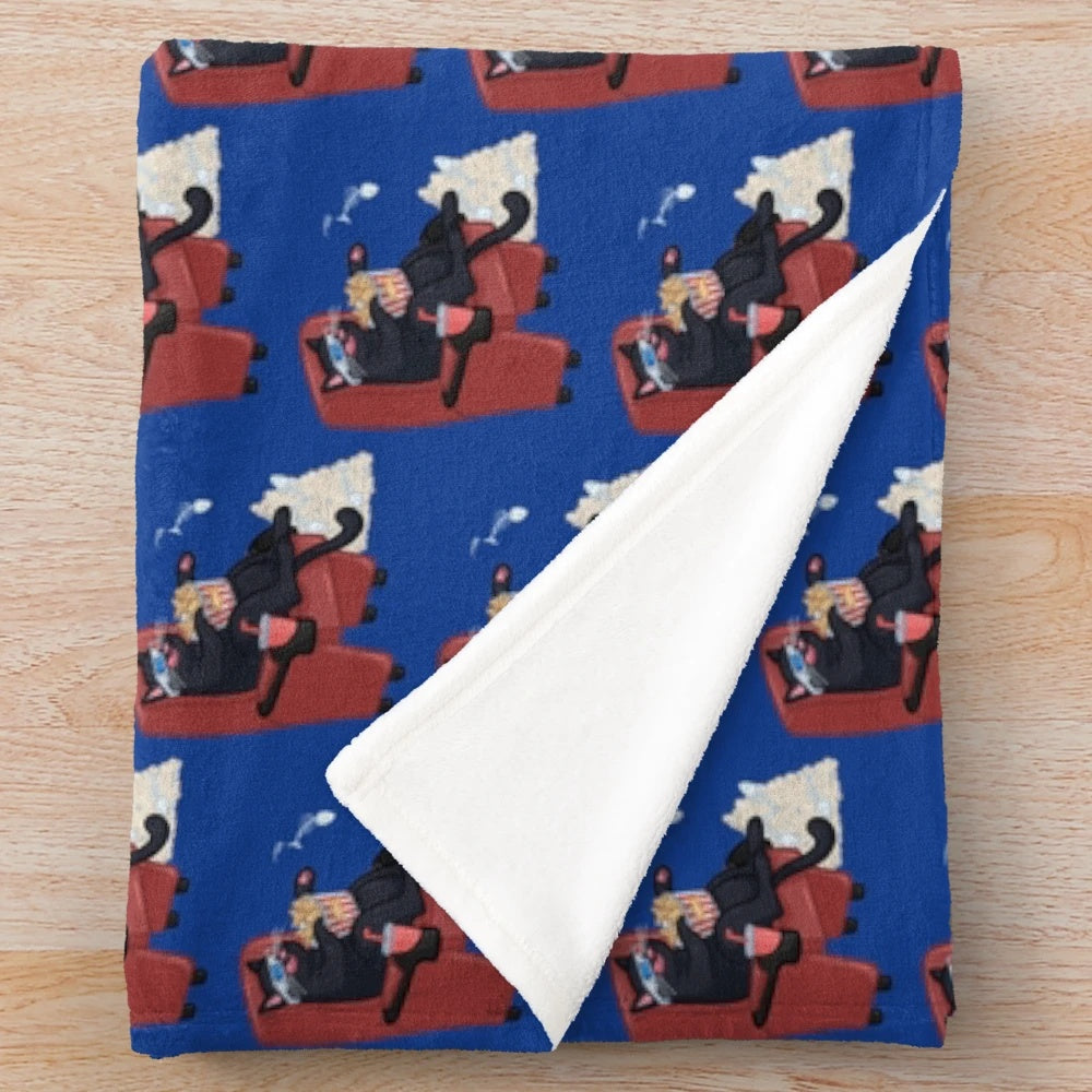 Colorful plush blanket with playful cat designs