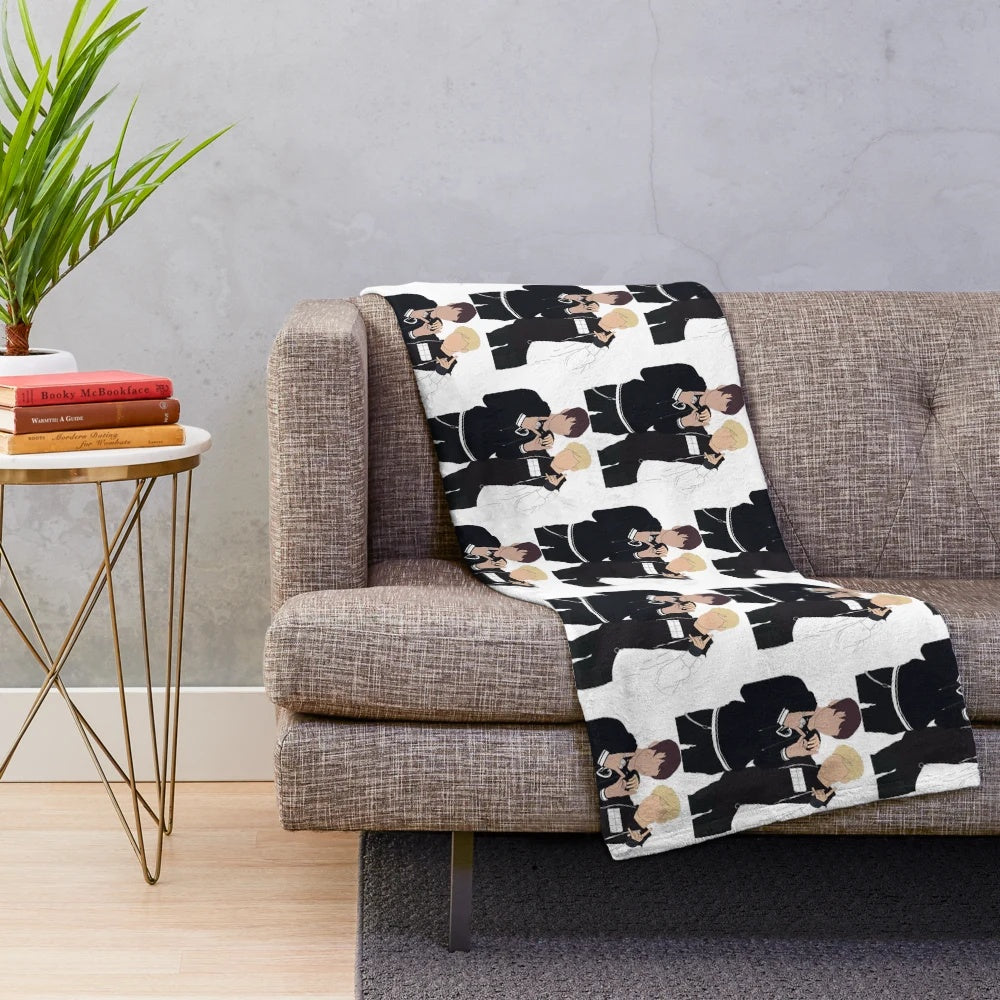Soft and cuddly plush blanket with Sam and Colby designs