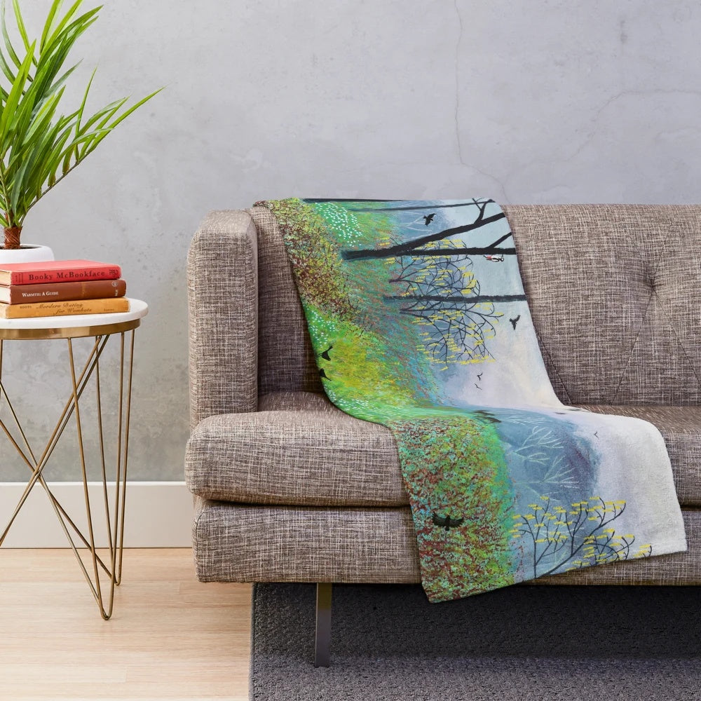 Plush blanket with snowdrop copse and nature landscape artwork by Jo Grundy