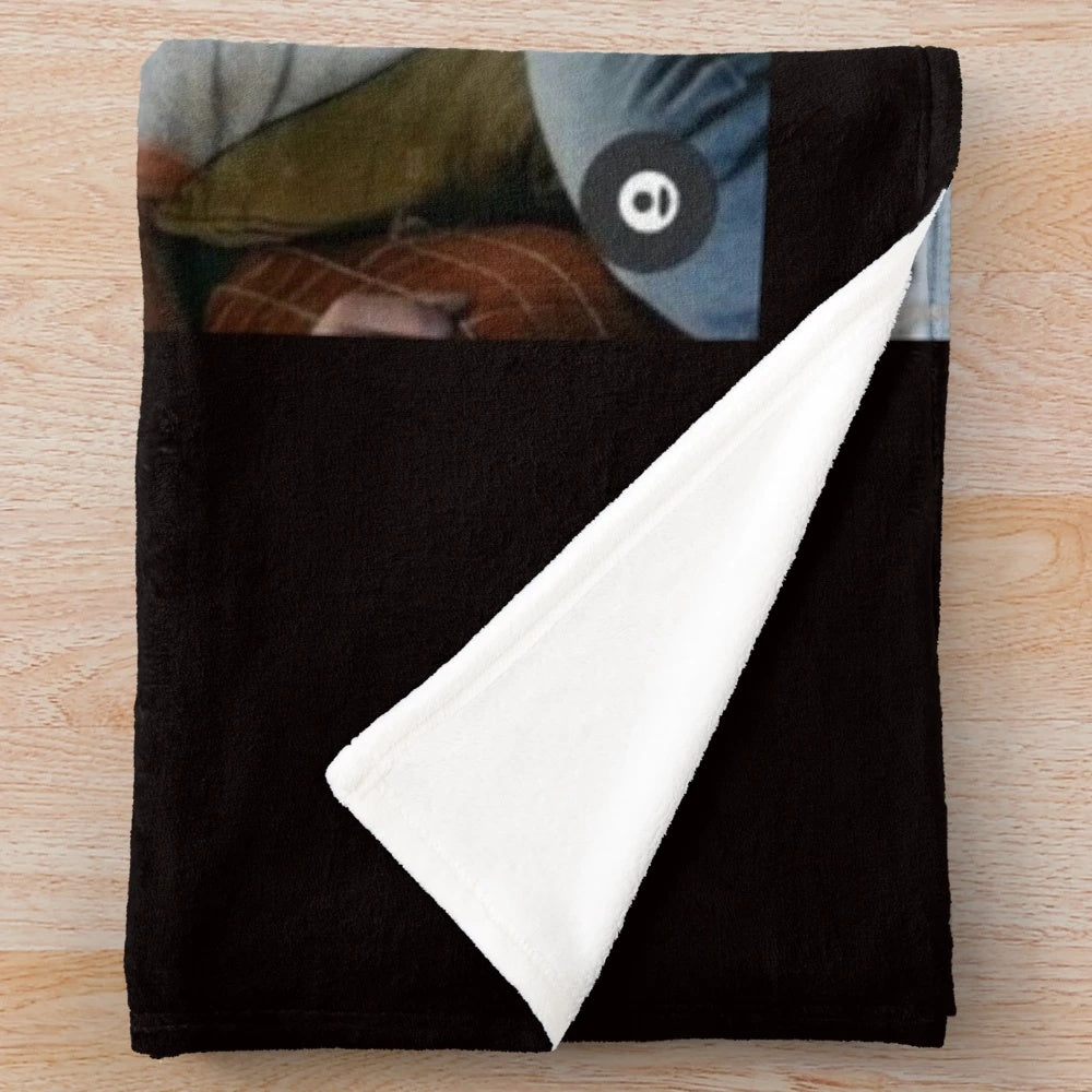 Plush blanket featuring the character George Cooper Jr from the popular TV show Young Sheldon