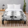 Plush blanket with a black and white portrait of acclaimed actor Willem Dafoe
