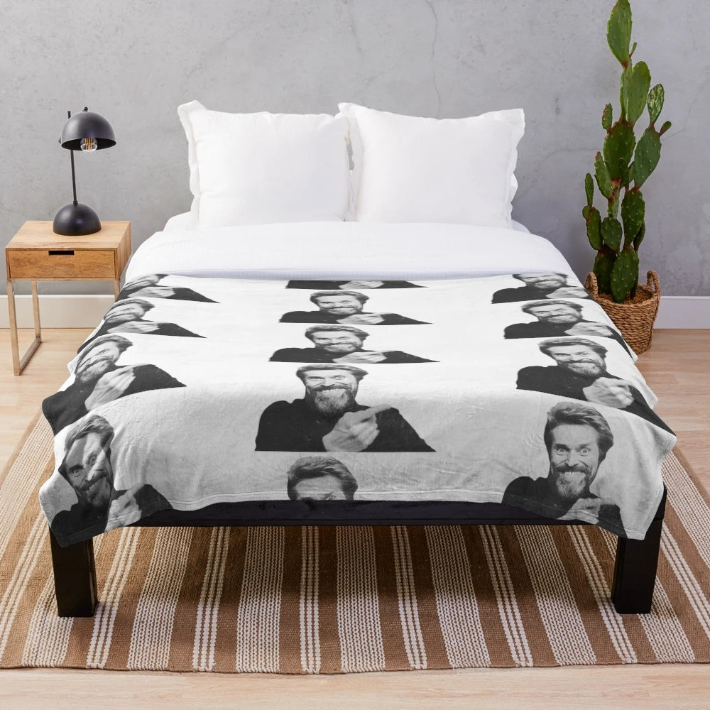 Plush blanket with a black and white portrait of acclaimed actor Willem Dafoe