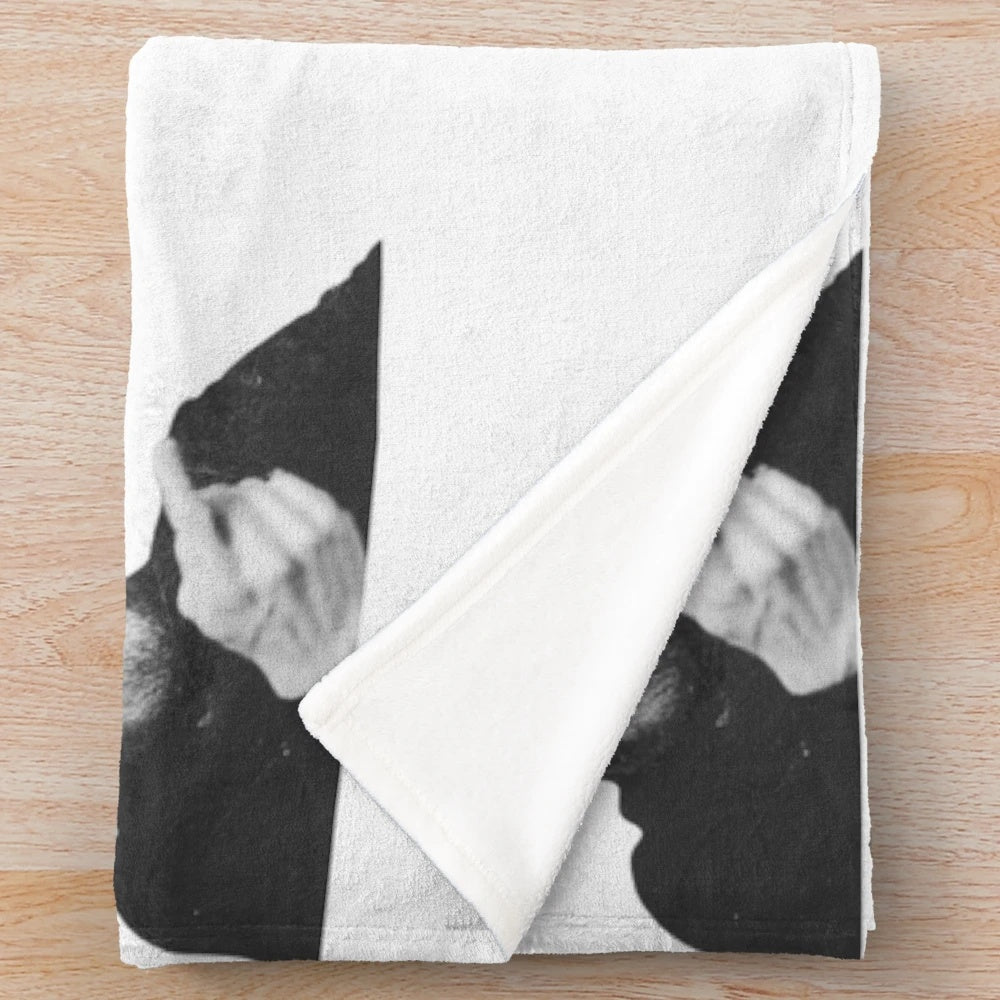 Plush blanket with a black and white portrait of acclaimed actor Willem Dafoe