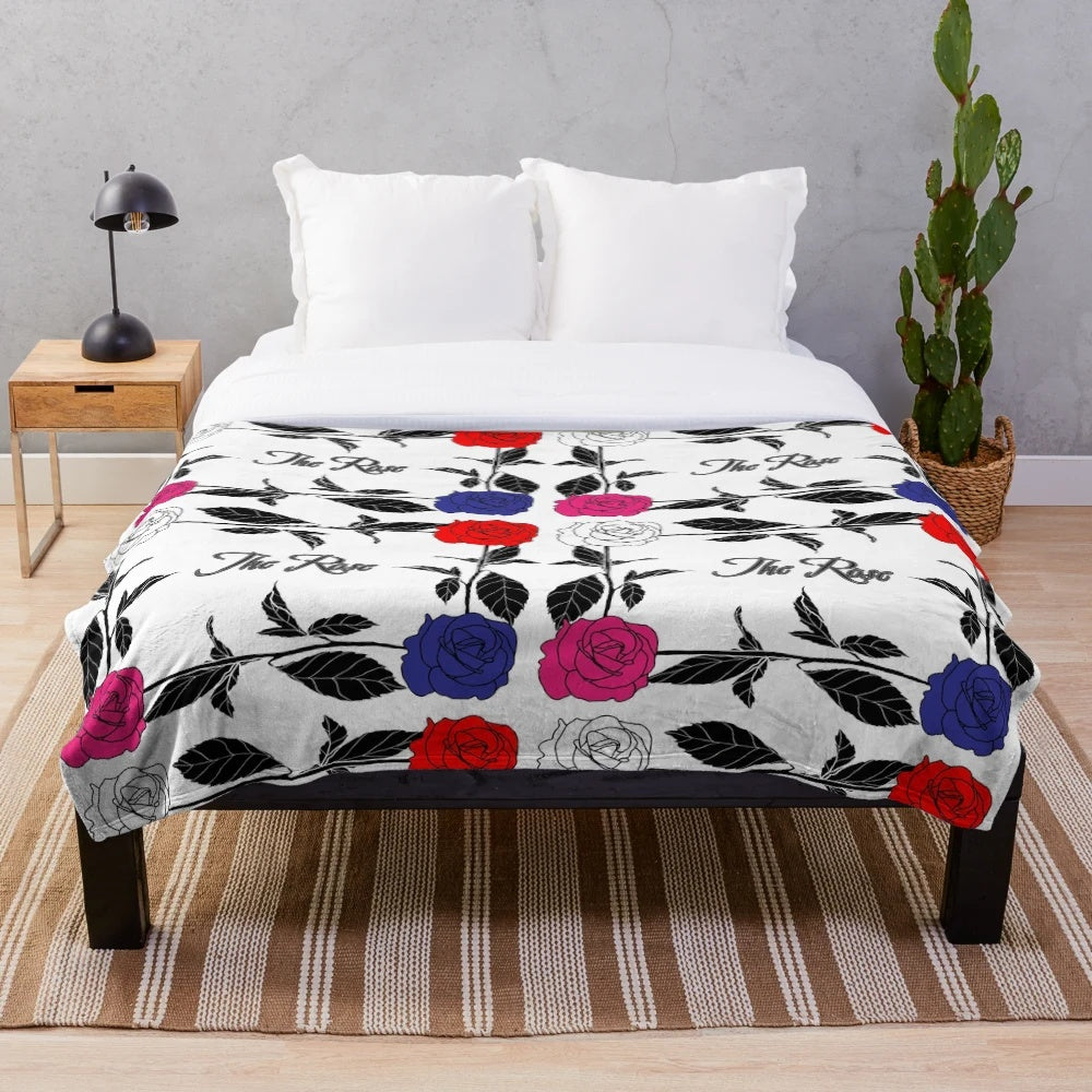 Plush blanket with the logo and members of the K-pop band The Rose