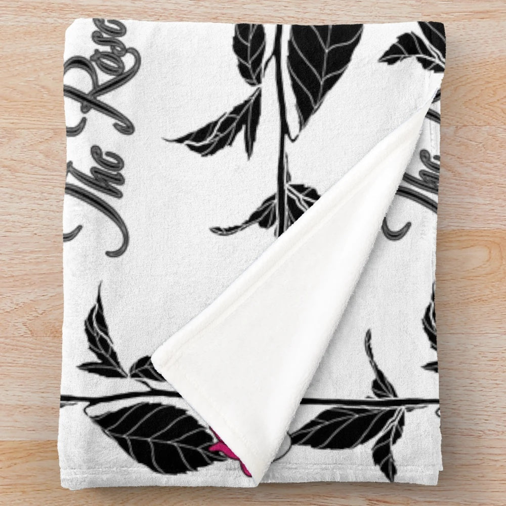 Plush blanket with the logo and members of the K-pop band The Rose