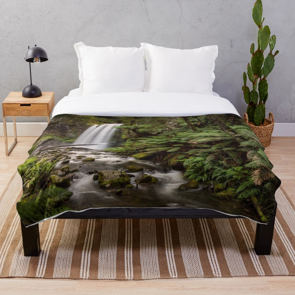 Plush blanket with a scenic image of Hopetoun Falls in the Otway Ranges, Victoria, Australia