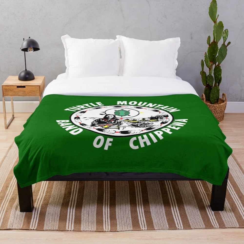 Plush blanket with Turtle Mountain Band of Chippewa native american design