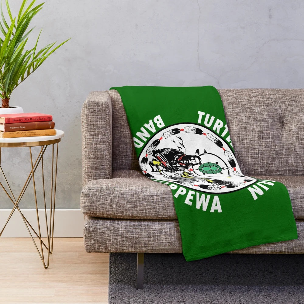 Plush blanket with Turtle Mountain Band of Chippewa native american design