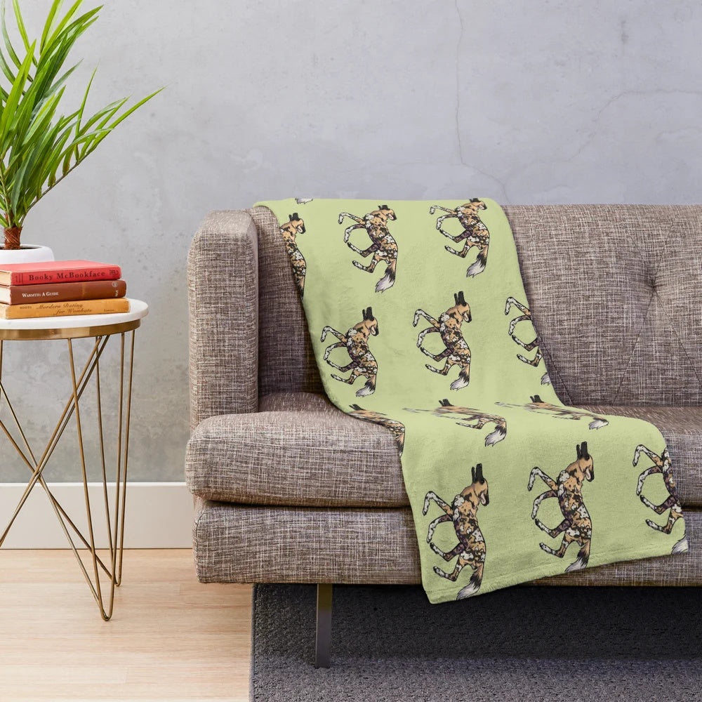 Cozy plush blanket with vibrant pattern of endangered African wild dog