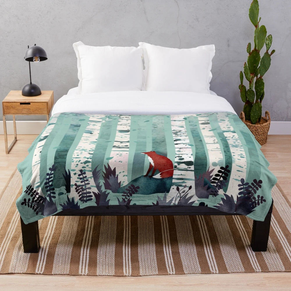 Plush blanket with watercolor forest design