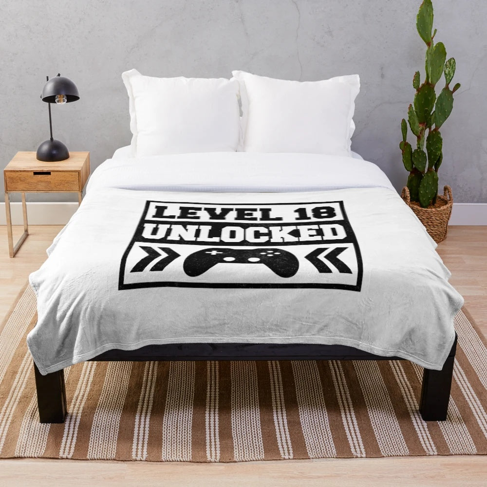 Plush gaming blanket with level up design for 18th birthday