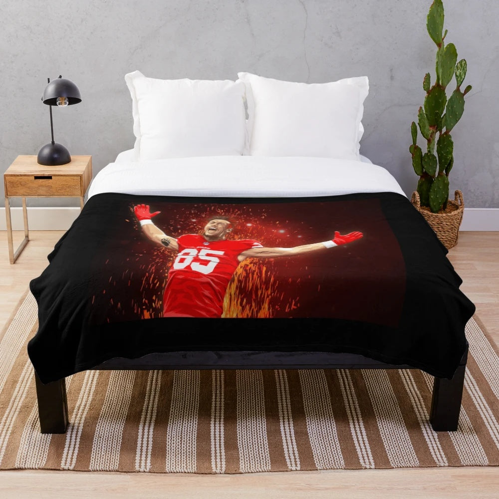 Soft and plush blanket featuring the 49ers team colors and George Kittle's jersey number