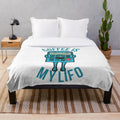 Plush blanket with a "Coffee Is My Lifo" accounting pun design