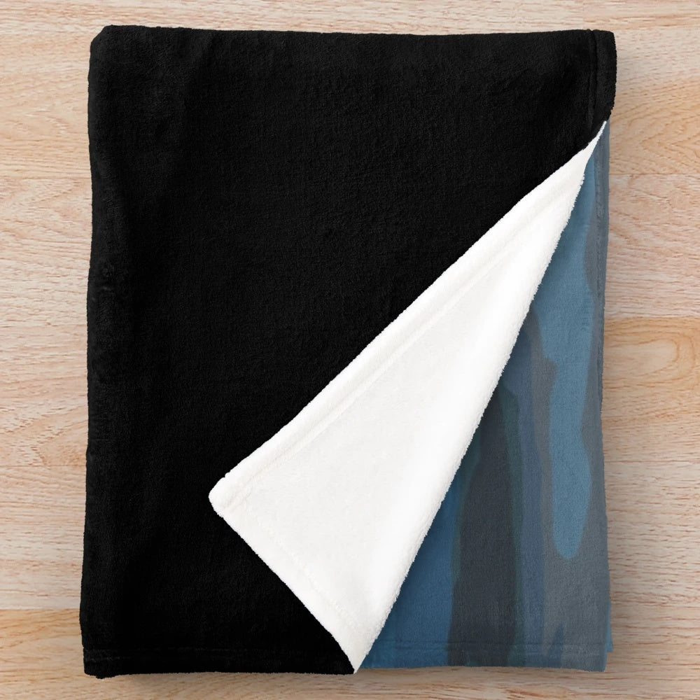 A plush blanket featuring a silhouette of a running girl against a scenic sunset backdrop